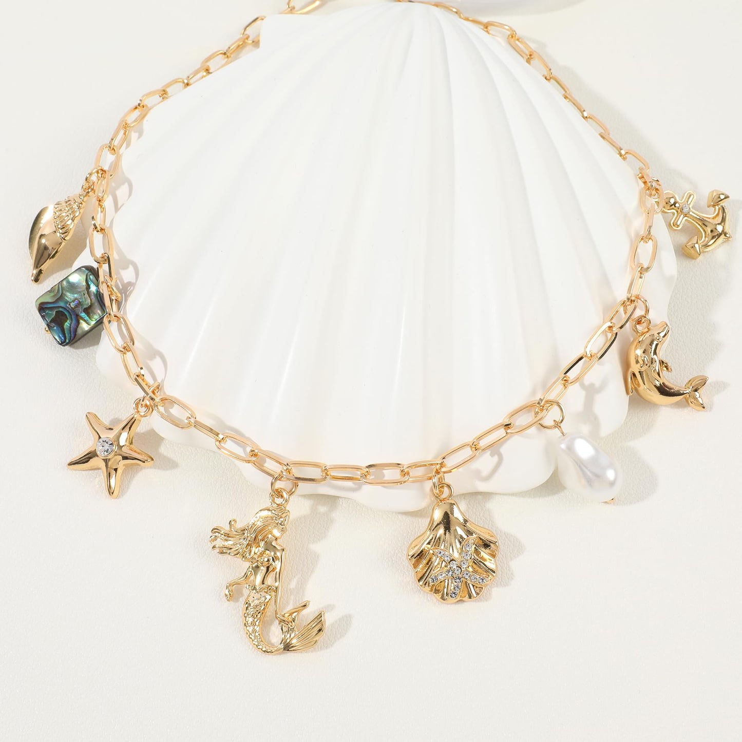 Gold Ocean Charm Necklace for Women Hawaii Chain Necklace with Cute Dangle Mermaid Shell Pearl Starfish Conch Dolphin Ship Anchor Sea Pendant Adjustable Trendy Y2K Summer Beach Jewelry Gift for Women