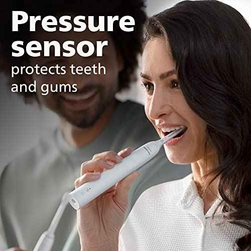 Philips Sonicare 4100 Rechargeable Electric Toothbrush, with Pressure Sensor, 2 Intensity Settings, SmarTimer and QuadPacer, 14-Day Battery Life, White, Model HX3681/23