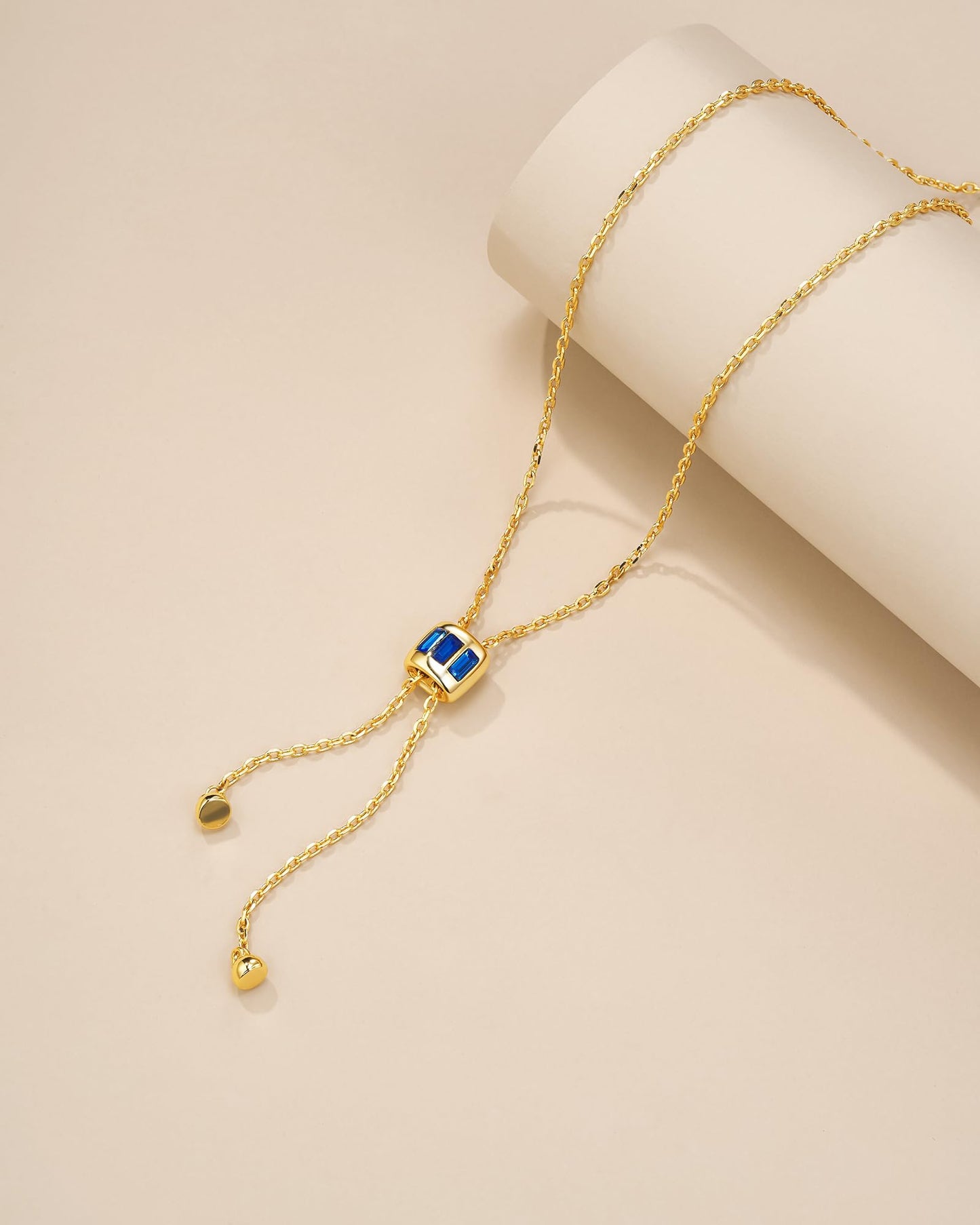 Visit the SNGIA Store Long Drop 18K Gold Plated Stacked Layered Lariat FULLY ADJUSTABLE Pull Through Blue Sapphire CZ Tassel Chain Pendant Necklace For Women by SNGIA, Dainty Trendy Gemstone Bolo Slip Sweater Statement Jewelry Gifts, Bohemian Vintage Hand