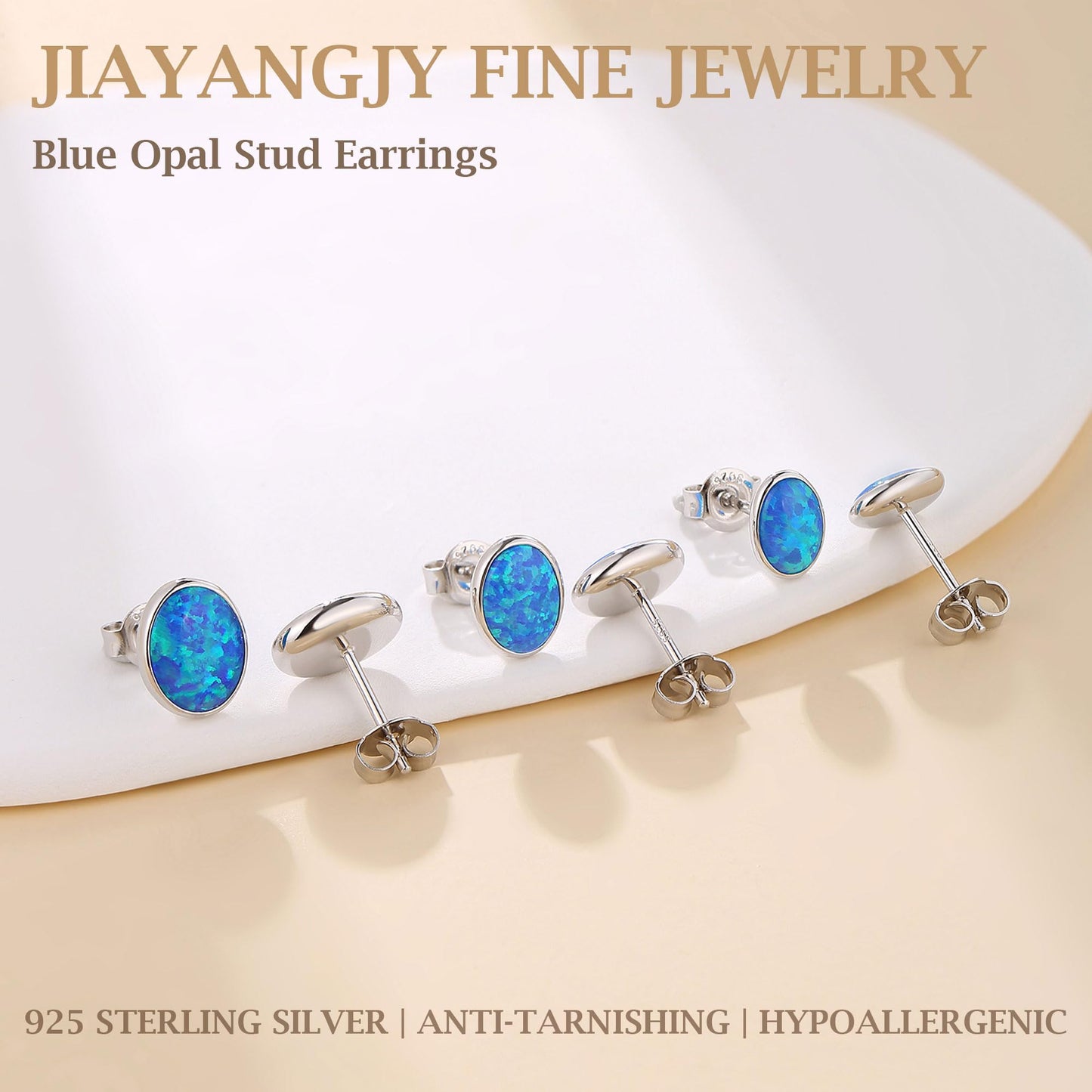 JiayangJY Silver Blue Fire Opal Stud Earrings for Women 18K White Gold Plated Sterling Silver Oval Shape 6mm Opal Earrings with Push Back