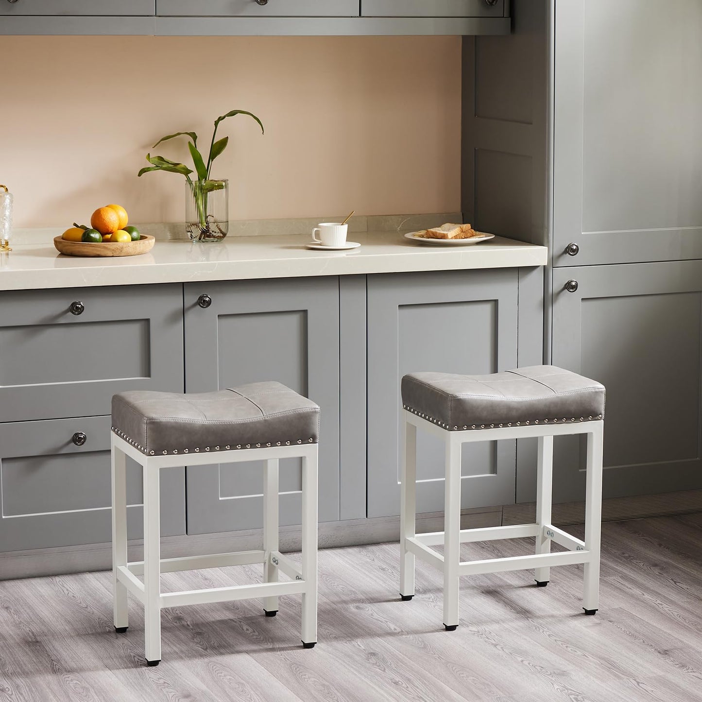 DUMOS Saddle Bar Stools Set of 2, 24 Inch Counter Height Stools with Curved PU Leather Surface, 3.7" Thick Upholstery Bar Height Stools with Footrest for Kitchen Island, Dining, Cafe, Gray