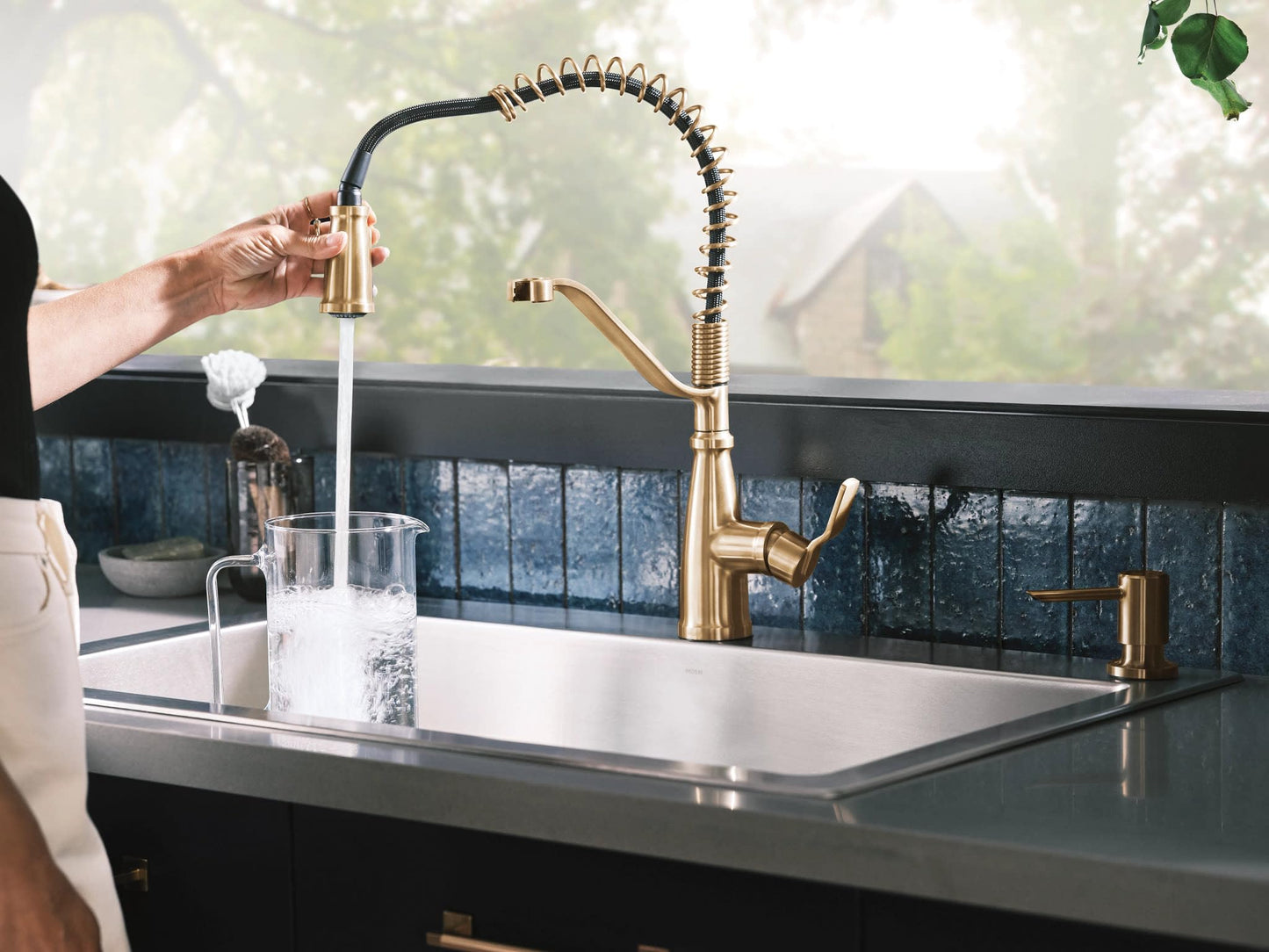 Moen Nolia Bronzed Gold One-Handle Single Hole Spring Kitchen Faucet with Pull Down Sprayer and Soap Dispenser, 87886BZG