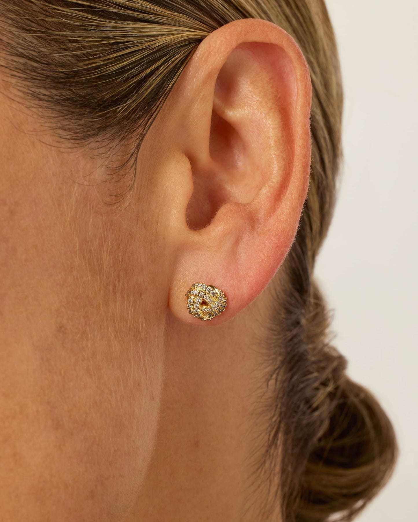 PAVOI 14K Gold Plated 925 Sterling Silver Post Cubic Zirconia Love Knot Stud Earrings, 14K Gold Plated in Yellow Gold
