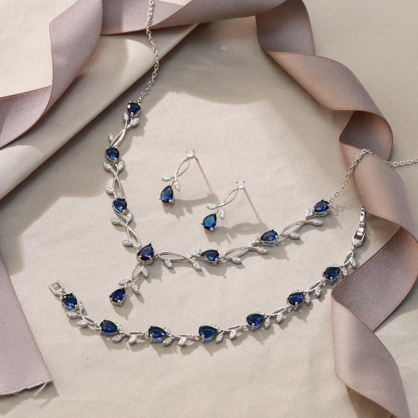 EVER FAITH Wedding Prom Jewelry Set for Bridesmaid, Blue Teardrop Cubic Zirconia Leaf Vine Bridal Party Necklace Dangle Earrings Bracelet Sets for Women
